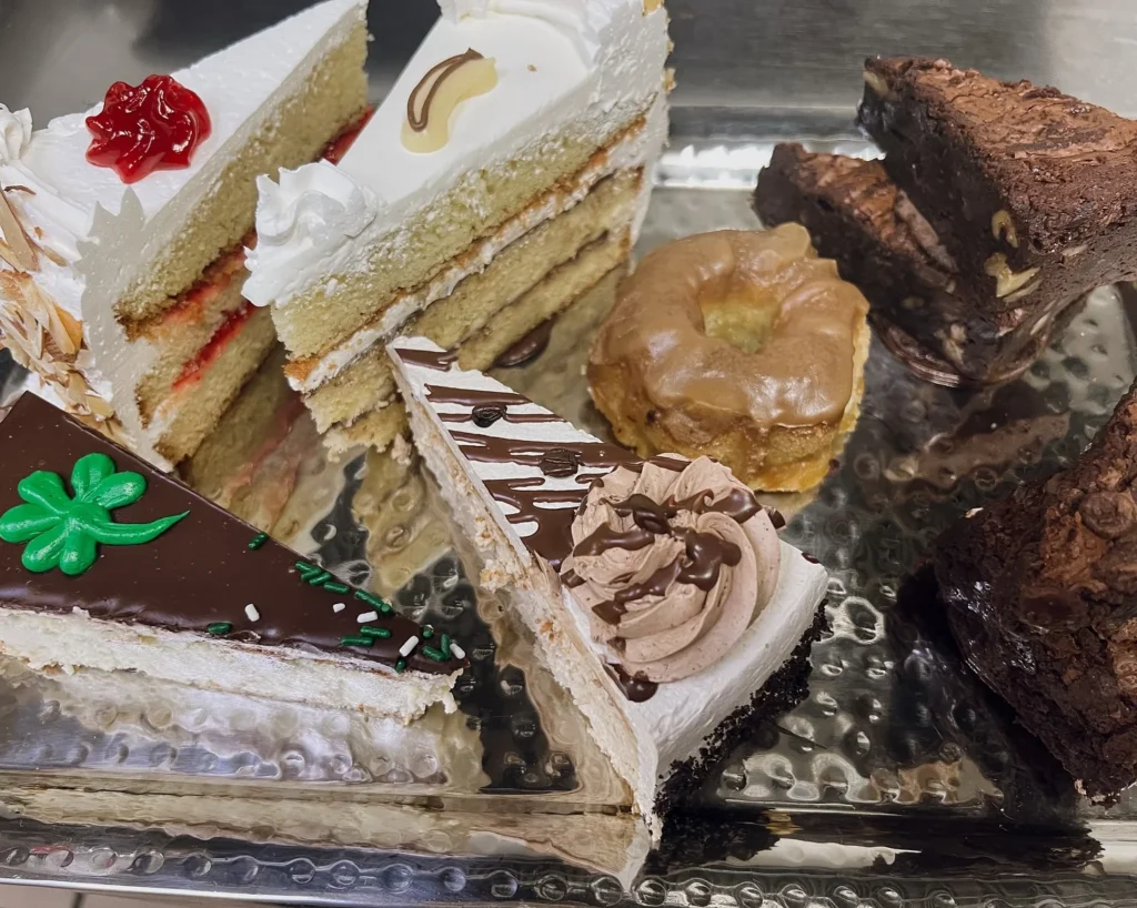 cheesecake with whipped cream and chocolate shavings goes here